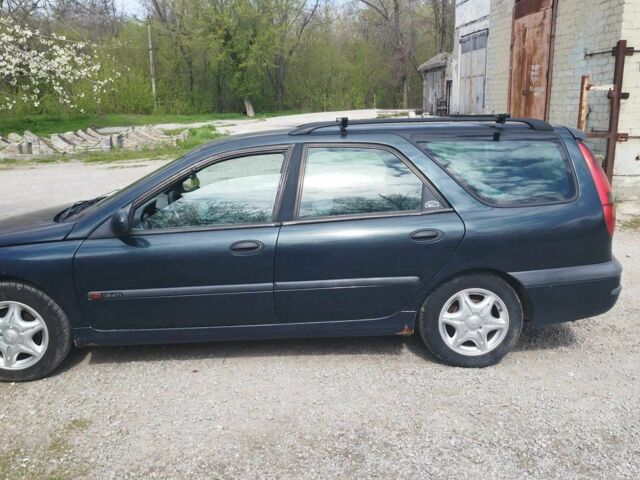 Зеленый Рено Лагуна, объемом двигателя 1.9 л и пробегом 400 тыс. км за 2800 $, фото 4 на Automoto.ua