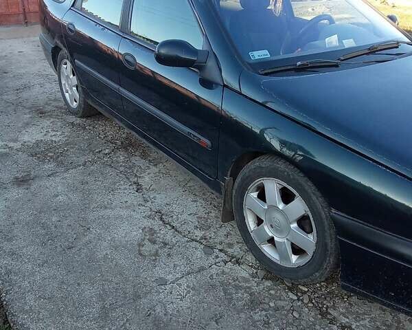 Зеленый Рено Лагуна, объемом двигателя 1.9 л и пробегом 290 тыс. км за 2400 $, фото 4 на Automoto.ua