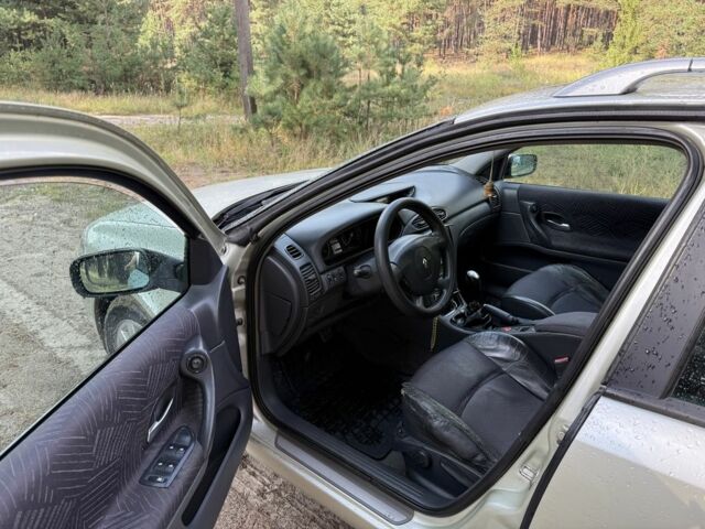 Зеленый Рено Лагуна, объемом двигателя 1.8 л и пробегом 216 тыс. км за 3950 $, фото 7 на Automoto.ua