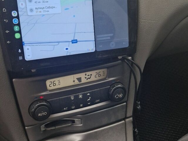 Зеленый Рено Лагуна, объемом двигателя 1.9 л и пробегом 352 тыс. км за 3250 $, фото 3 на Automoto.ua