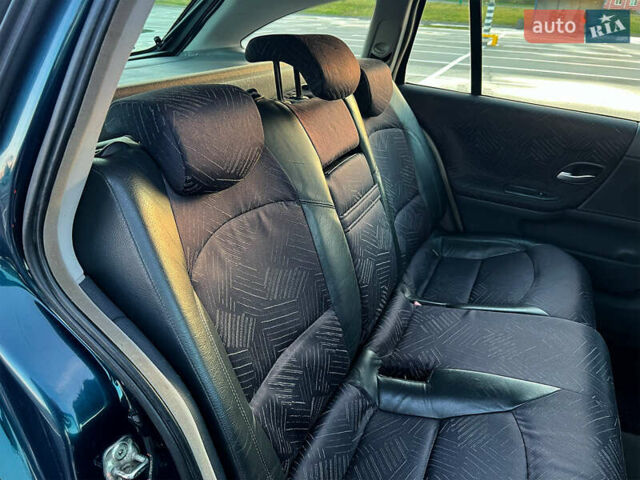 Зеленый Рено Лагуна, объемом двигателя 1.9 л и пробегом 328 тыс. км за 3500 $, фото 7 на Automoto.ua
