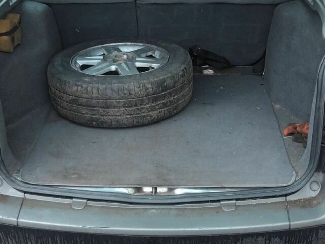 Зеленый Рено Лагуна, объемом двигателя 2 л и пробегом 450 тыс. км за 1700 $, фото 4 на Automoto.ua