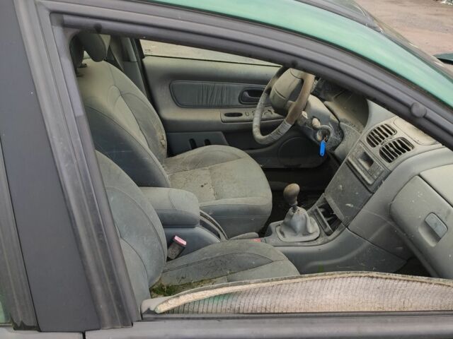 Зеленый Рено Лагуна, объемом двигателя 2 л и пробегом 170 тыс. км за 596 $, фото 3 на Automoto.ua