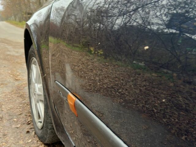 Зеленый Рено Лагуна, объемом двигателя 1.9 л и пробегом 440 тыс. км за 4200 $, фото 4 на Automoto.ua