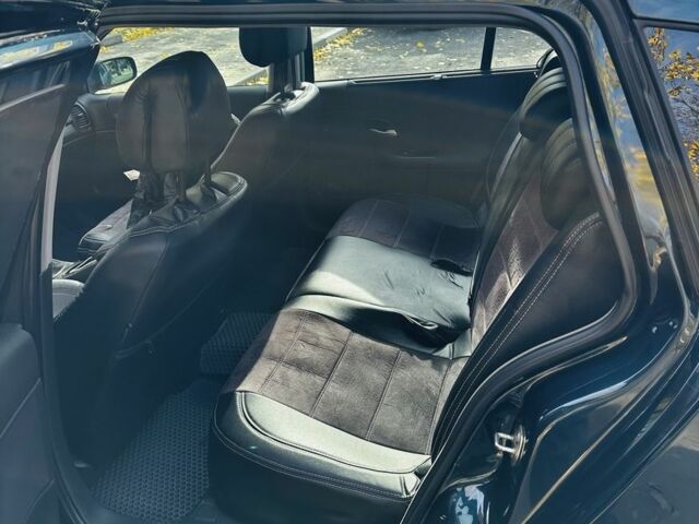 Зеленый Рено Лагуна, объемом двигателя 2 л и пробегом 200 тыс. км за 4250 $, фото 18 на Automoto.ua