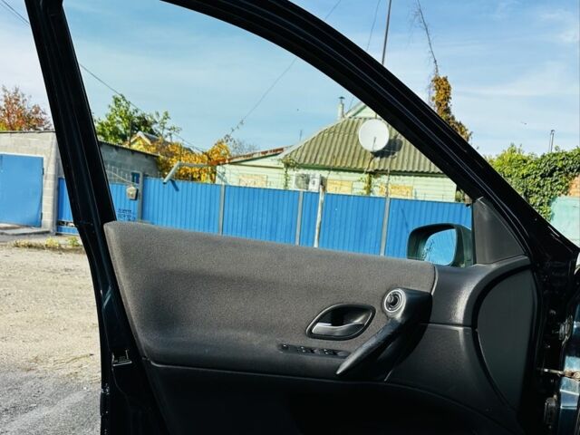 Зеленый Рено Лагуна, объемом двигателя 2 л и пробегом 200 тыс. км за 4250 $, фото 11 на Automoto.ua