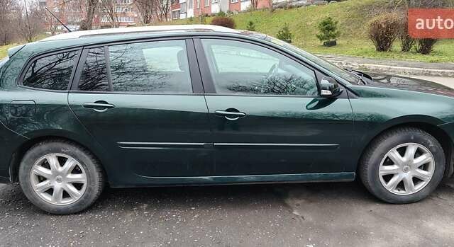 Зелений Рено Лагуна, об'ємом двигуна 1.46 л та пробігом 300 тис. км за 6700 $, фото 3 на Automoto.ua