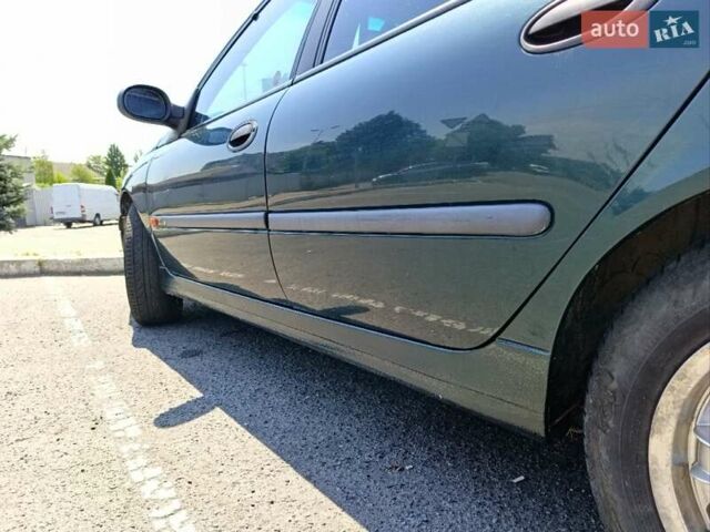 Зеленый Рено Лагуна, объемом двигателя 2 л и пробегом 325 тыс. км за 2400 $, фото 7 на Automoto.ua