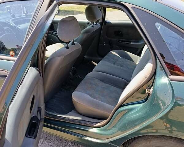 Зеленый Рено Лагуна, объемом двигателя 2 л и пробегом 325 тыс. км за 2400 $, фото 3 на Automoto.ua