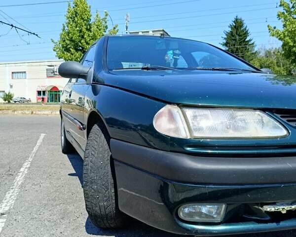 Зеленый Рено Лагуна, объемом двигателя 2 л и пробегом 325 тыс. км за 2400 $, фото 11 на Automoto.ua