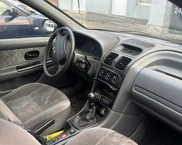 Зеленый Рено Лагуна, объемом двигателя 1.79 л и пробегом 400 тыс. км за 1200 $, фото 4 на Automoto.ua