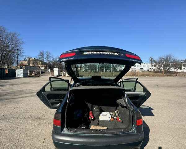 Зелений Рено Лагуна, об'ємом двигуна 1.8 л та пробігом 225 тис. км за 2450 $, фото 12 на Automoto.ua