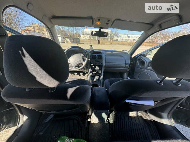 Зелений Рено Лагуна, об'ємом двигуна 1.8 л та пробігом 225 тис. км за 2450 $, фото 10 на Automoto.ua