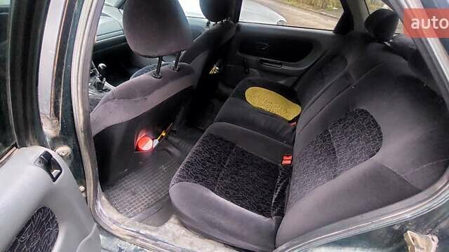 Зелений Рено Лагуна, об'ємом двигуна 1.8 л та пробігом 650 тис. км за 1700 $, фото 5 на Automoto.ua