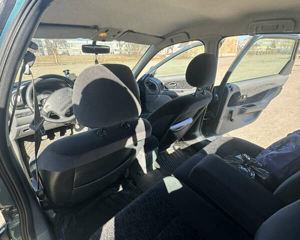 Зелений Рено Лагуна, об'ємом двигуна 1.8 л та пробігом 225 тис. км за 2450 $, фото 9 на Automoto.ua