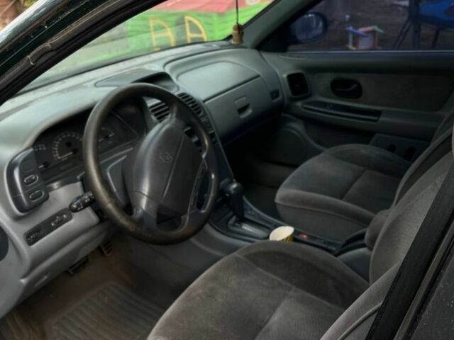 Зеленый Рено Лагуна, объемом двигателя 3 л и пробегом 350 тыс. км за 2200 $, фото 2 на Automoto.ua