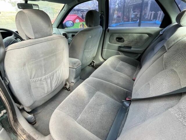 Зеленый Рено Лагуна, объемом двигателя 3 л и пробегом 350 тыс. км за 2200 $, фото 3 на Automoto.ua