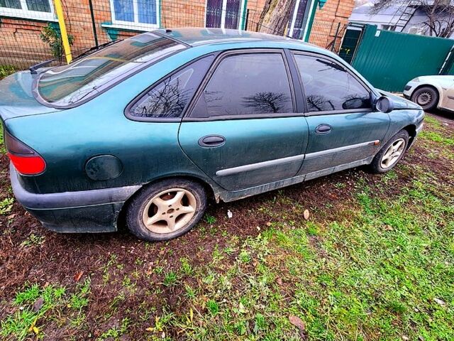 Зеленый Рено Лагуна, объемом двигателя 1.8 л и пробегом 300 тыс. км за 480 $, фото 7 на Automoto.ua