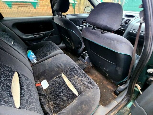 Зеленый Рено Лагуна, объемом двигателя 1.8 л и пробегом 300 тыс. км за 480 $, фото 6 на Automoto.ua