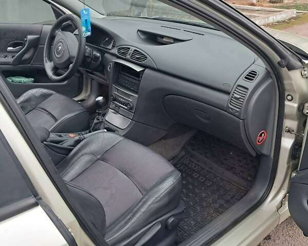 Зеленый Рено Лагуна, объемом двигателя 1.87 л и пробегом 396 тыс. км за 4000 $, фото 9 на Automoto.ua