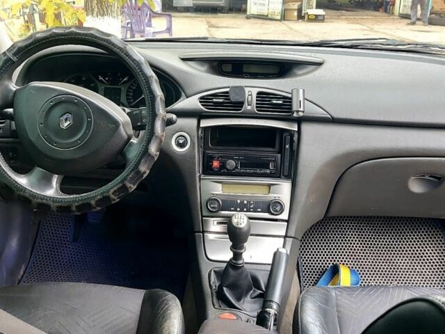 Зелений Рено Лагуна, об'ємом двигуна 1.9 л та пробігом 275 тис. км за 2000 $, фото 6 на Automoto.ua