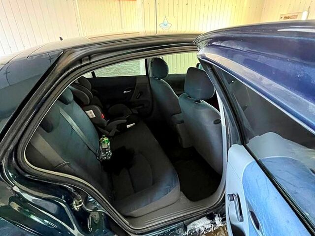 Зеленый Рено Лагуна, объемом двигателя 1.9 л и пробегом 223 тыс. км за 4150 $, фото 3 на Automoto.ua