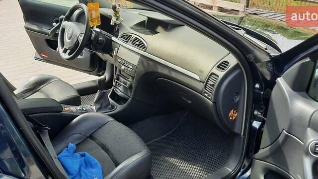 Зеленый Рено Лагуна, объемом двигателя 1.6 л и пробегом 258 тыс. км за 5000 $, фото 5 на Automoto.ua