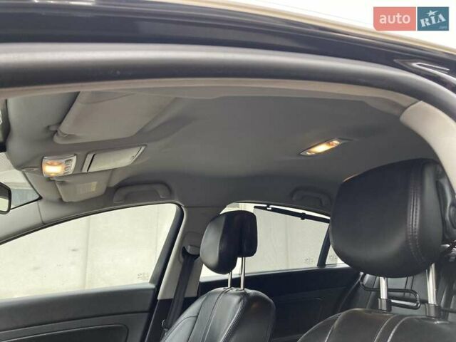 Черный Рено Латитьюд, объемом двигателя 2.5 л и пробегом 306 тыс. км за 6300 $, фото 15 на Automoto.ua