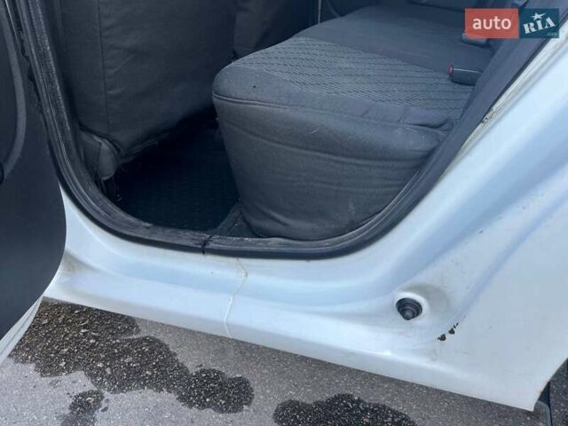 Белый Рено Логан, объемом двигателя 1.4 л и пробегом 199 тыс. км за 3700 $, фото 17 на Automoto.ua