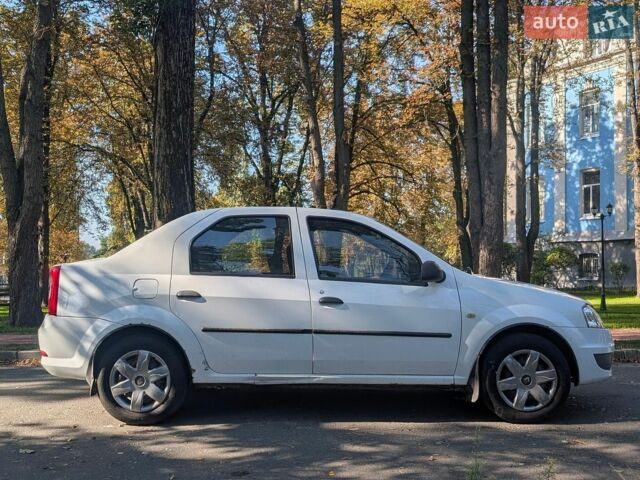 Білий Рено Логан, об'ємом двигуна 1.39 л та пробігом 450 тис. км за 3450 $, фото 5 на Automoto.ua