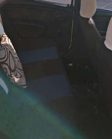 Білий Рено Логан, об'ємом двигуна 1.39 л та пробігом 320 тис. км за 3000 $, фото 8 на Automoto.ua