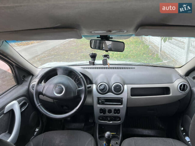 Белый Рено Логан, объемом двигателя 1.39 л и пробегом 250 тыс. км за 2000 $, фото 10 на Automoto.ua