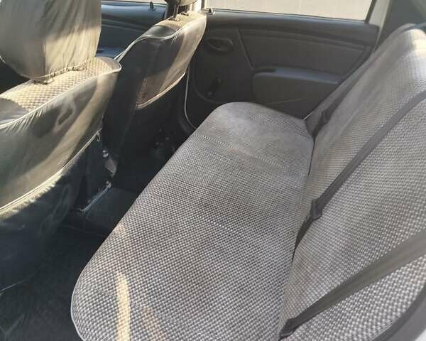 Белый Рено Логан, объемом двигателя 1.39 л и пробегом 48 тыс. км за 5000 $, фото 7 на Automoto.ua