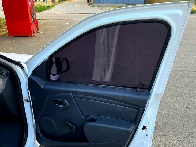 Білий Рено Логан, об'ємом двигуна 1.4 л та пробігом 78 тис. км за 4500 $, фото 8 на Automoto.ua