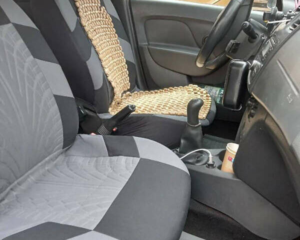 Білий Рено Логан, об'ємом двигуна 1.15 л та пробігом 210 тис. км за 2800 $, фото 6 на Automoto.ua