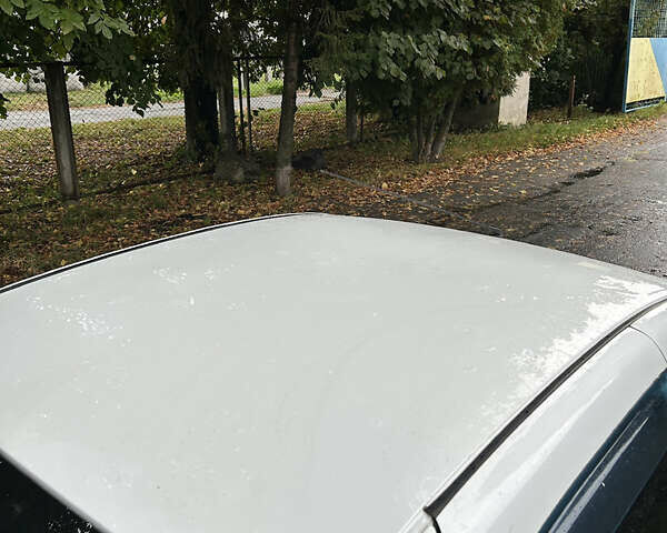 Білий Рено Логан, об'ємом двигуна 1.15 л та пробігом 353 тис. км за 3600 $, фото 7 на Automoto.ua