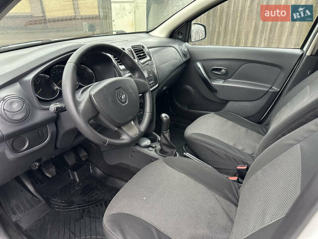 Білий Рено Логан, об'ємом двигуна 1.2 л та пробігом 277 тис. км за 4500 $, фото 8 на Automoto.ua