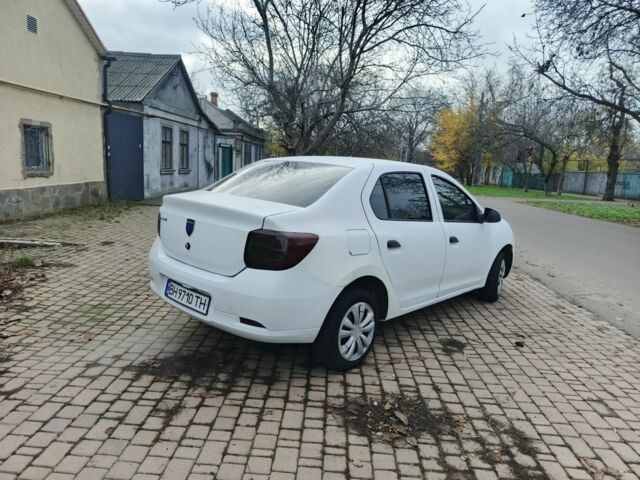 Білий Рено Логан, об'ємом двигуна 1.1 л та пробігом 220 тис. км за 3900 $, фото 1 на Automoto.ua