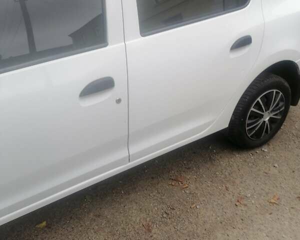 Білий Рено Логан, об'ємом двигуна 1.46 л та пробігом 230 тис. км за 4900 $, фото 6 на Automoto.ua