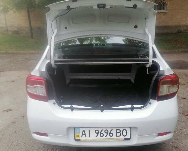Білий Рено Логан, об'ємом двигуна 1.46 л та пробігом 230 тис. км за 4900 $, фото 15 на Automoto.ua