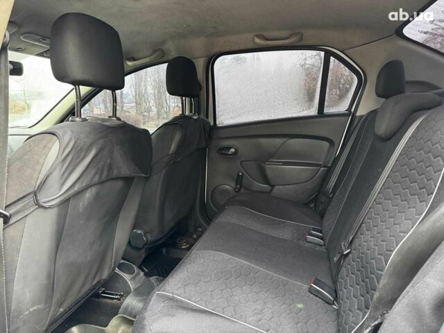 Білий Рено Логан, об'ємом двигуна 1.2 л та пробігом 390 тис. км за 3690 $, фото 19 на Automoto.ua