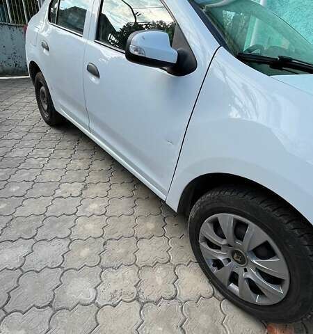 Білий Рено Логан, об'ємом двигуна 1.46 л та пробігом 245 тис. км за 4950 $, фото 1 на Automoto.ua