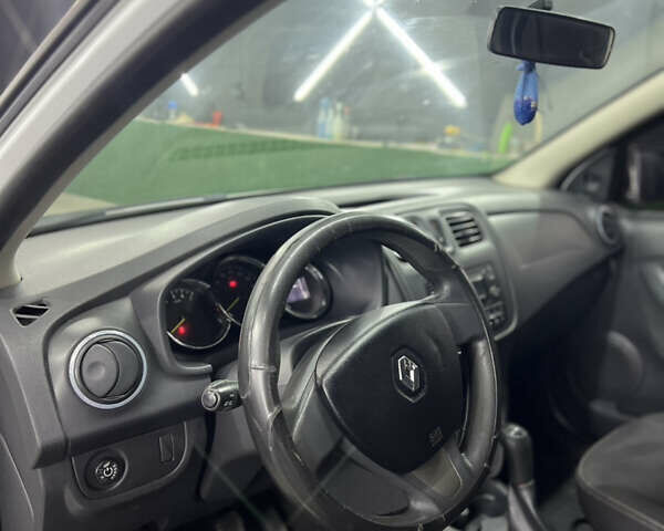 Білий Рено Логан, об'ємом двигуна 1.2 л та пробігом 197 тис. км за 5700 $, фото 26 на Automoto.ua