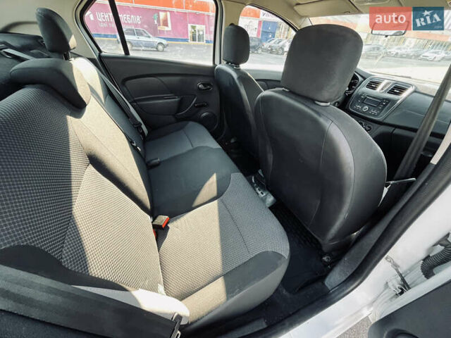 Білий Рено Логан, об'ємом двигуна 1.15 л та пробігом 153 тис. км за 5900 $, фото 23 на Automoto.ua