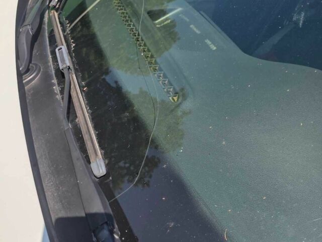 Білий Рено Логан, об'ємом двигуна 1.2 л та пробігом 135 тис. км за 4500 $, фото 4 на Automoto.ua