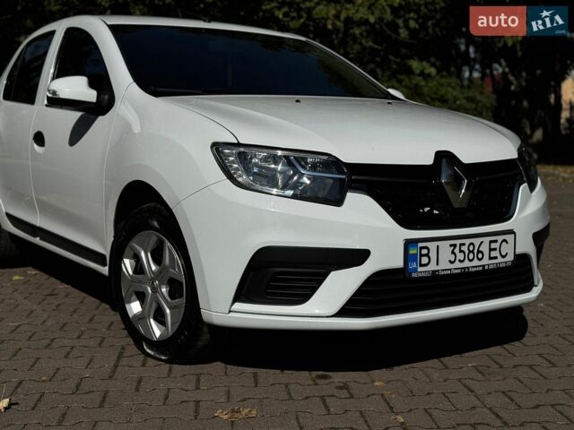 Білий Рено Логан, об'ємом двигуна 1.46 л та пробігом 157 тис. км за 7000 $, фото 19 на Automoto.ua