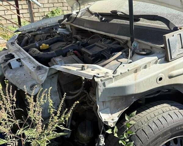 Білий Рено Логан, об'ємом двигуна 1.5 л та пробігом 250 тис. км за 3500 $, фото 10 на Automoto.ua
