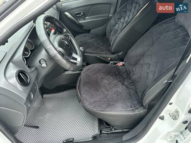 Білий Рено Логан, об'ємом двигуна 1.5 л та пробігом 127 тис. км за 7400 $, фото 41 на Automoto.ua