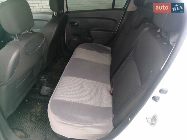 Білий Рено Логан, об'ємом двигуна 1.46 л та пробігом 267 тис. км за 6300 $, фото 13 на Automoto.ua