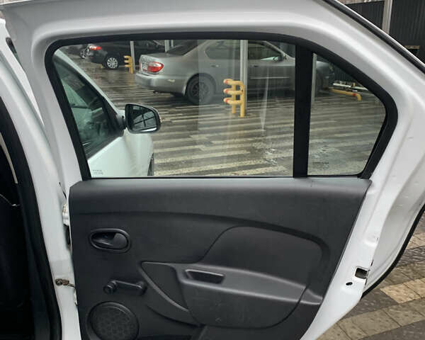 Білий Рено Логан, об'ємом двигуна 1.46 л та пробігом 153 тис. км за 7300 $, фото 11 на Automoto.ua